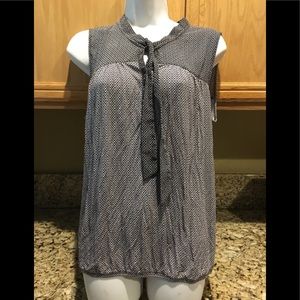 Navy and white sleeveless blouse